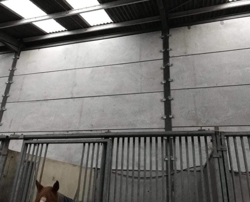 Pre-stressed wall panels for horse stables